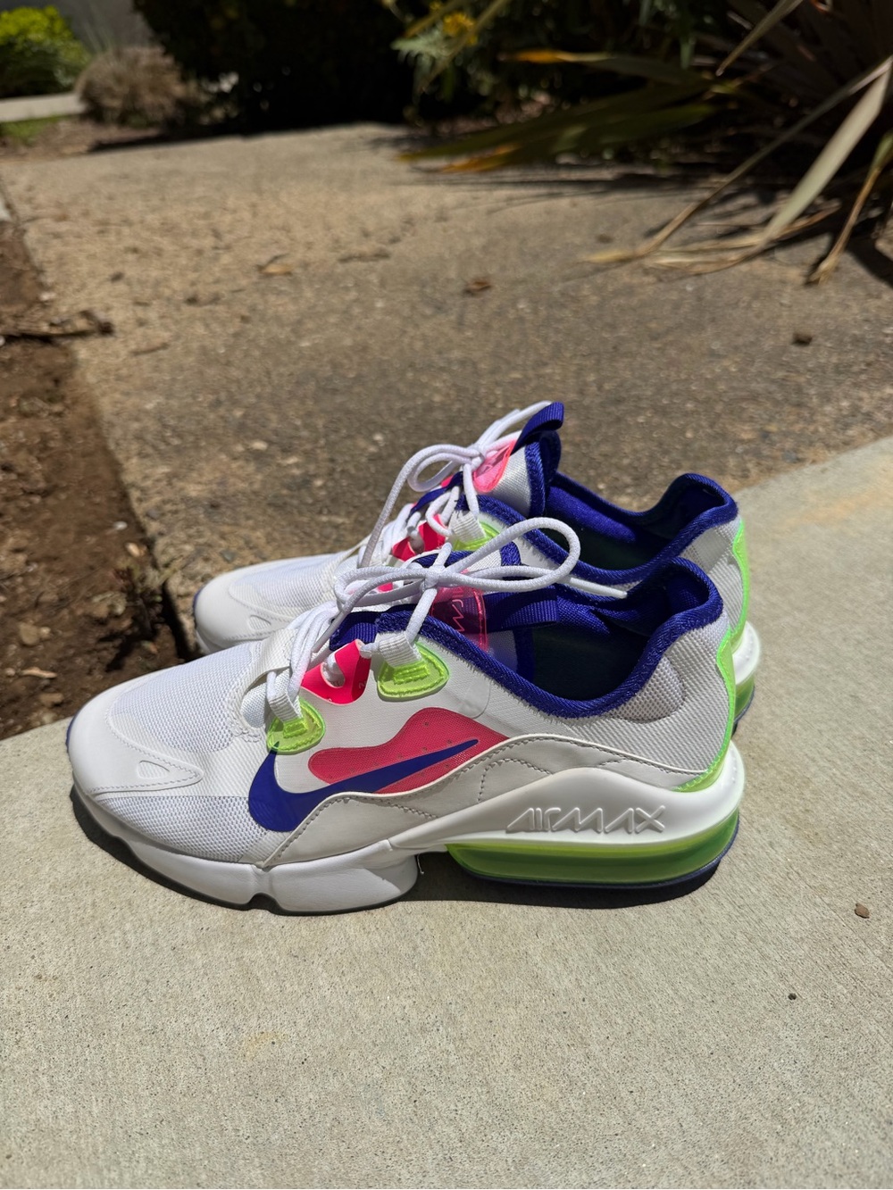 Nike White Athletic Sneakers with Pink, Blue & Neon Green Accents